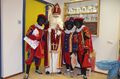 Sinterklaas met Zwarte Pieten op bezoek op een basisschool, 2012