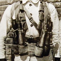 Chinese combat vest circa 1942 outfitted with four Chinese made stick grenades