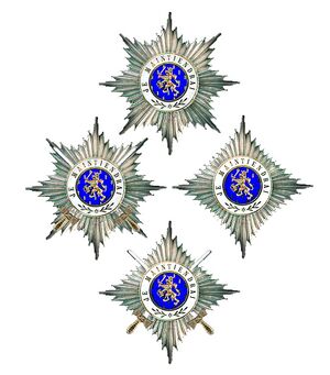 Vier sterren van de Orde van Oranje-Nassau in 2012.jpg
