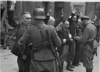 Photo from the Stroop Report of the Warsaw Ghetto Uprising, 1943; showing MP 28s.