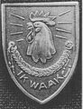 Wapen Korps Politietroepen - Het Korps Politietroepen werd op 26 juni 1919 opgericht met als taak het verrichten van politiediensten ten behoeve van het leger. De haan met het onderschrift 'Ik waak', afgebeeld op de draagspeld, wordt min of meer beschouwd als het officiële embleem.